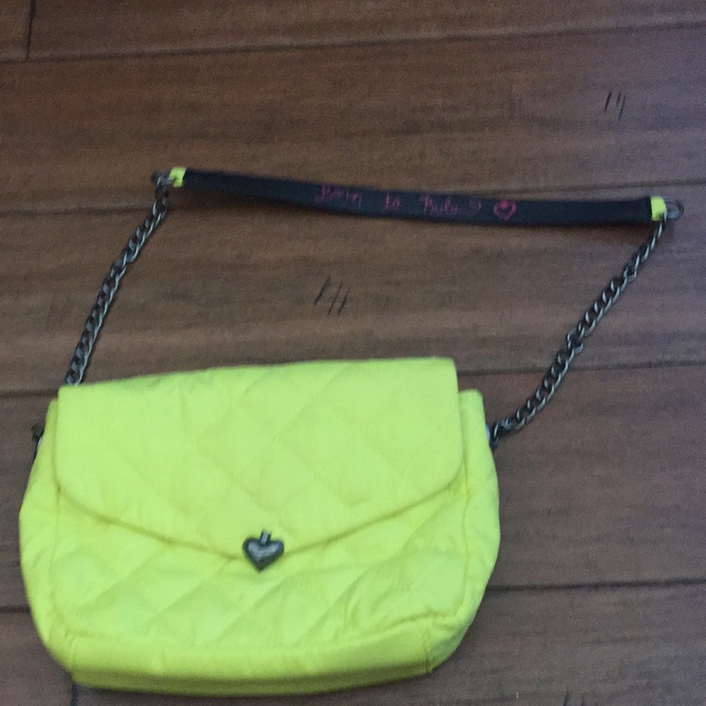 Princess Vera Wang “Born to Rule” handbag